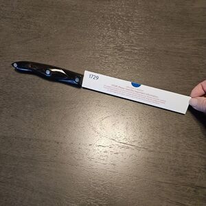 Cutco USA #1729 Serrated Carving Knife With Brown Signature Handle